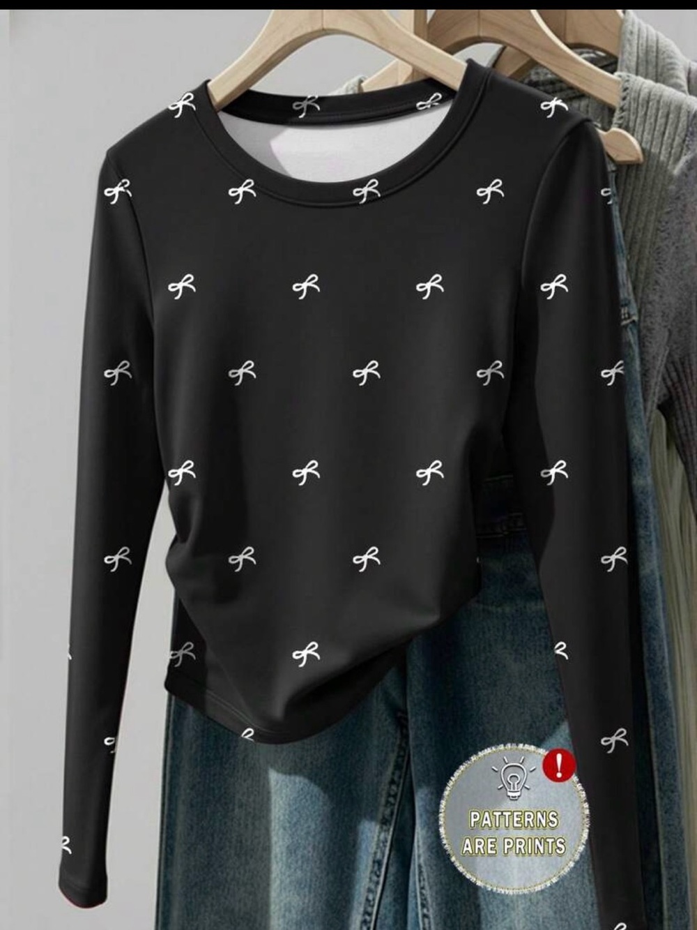Black Long-Sleeve Bow Print Top